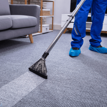 Perth cleaning team using industrial vacuum on tiled floor